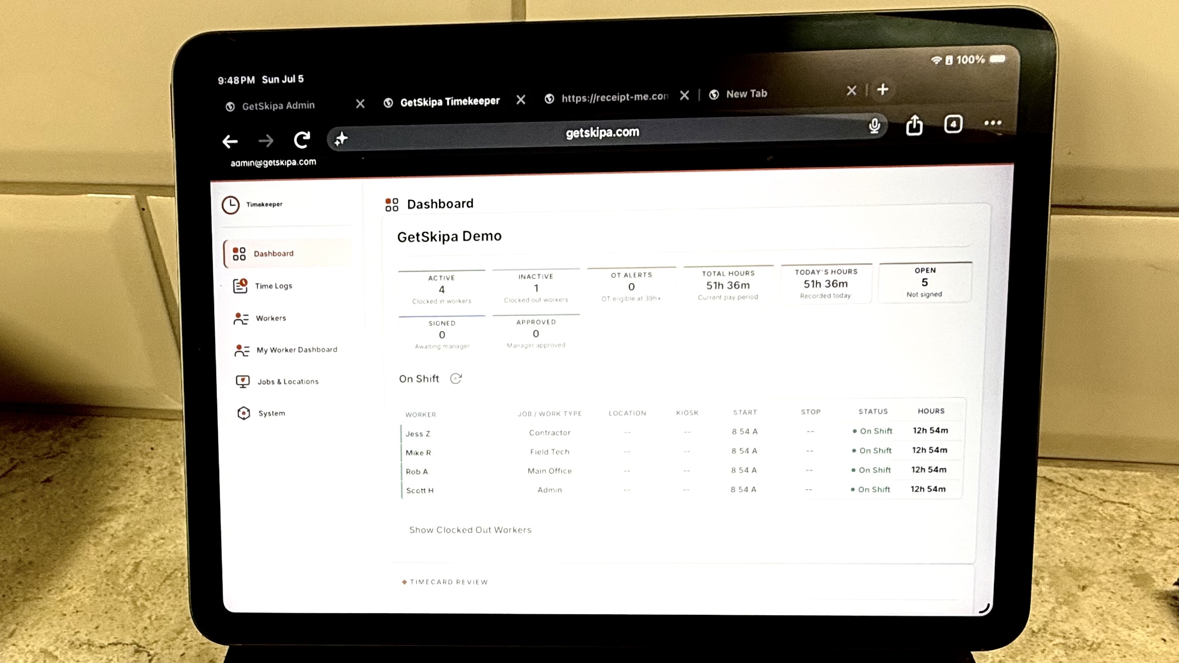 Timekeeper owner dashboard showing active workers and time log history.